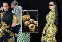 Kim Kardashian tregon linjat tërheqëse në kostumin “Balenciaga” të bërë me shirita ngjitës gjatë paraqitjes në Javën e Modës në Paris